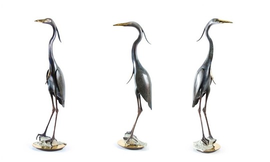 Medium_blue_heron_on_rock_25-37_3400